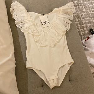 White Zara bodysuit with top ruffles